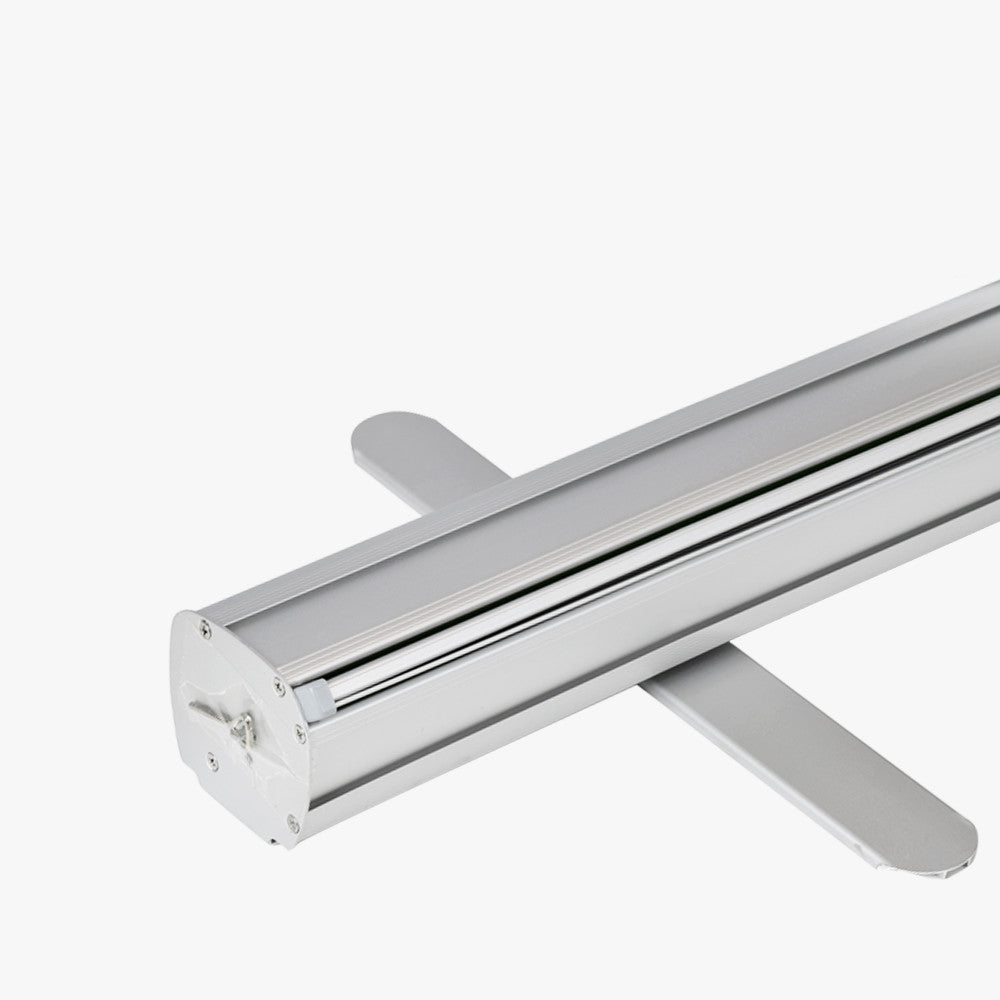 Chrome metal track lighting fixture on a white background