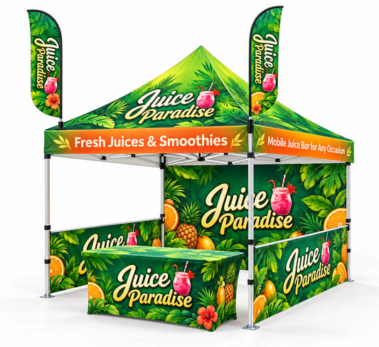 A green Juice Paradise promotional canopy tent with matching front counter and vertical feather flags, shown on a clean white background. The design features tropical leaf patterns, fruit illustrations, and large 'Juice Paradise' branding with smoothie and juice graphics.