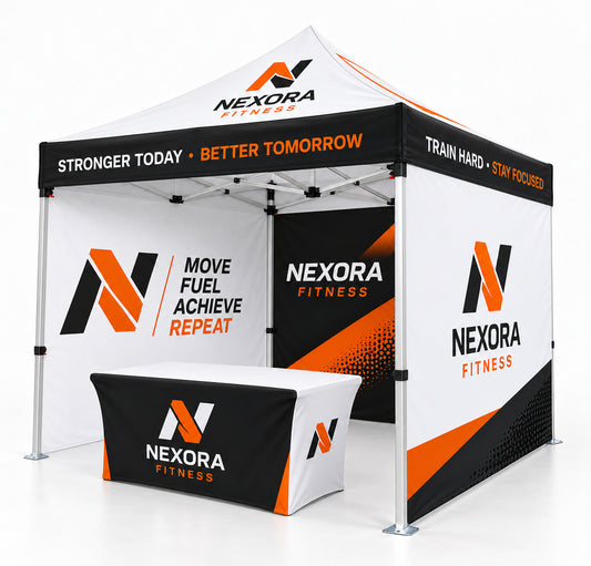 Custom Nexora Fitness pop-up canopy tent with branded side panels, a matching branded table cover, and a floor mat on a white studio background.
