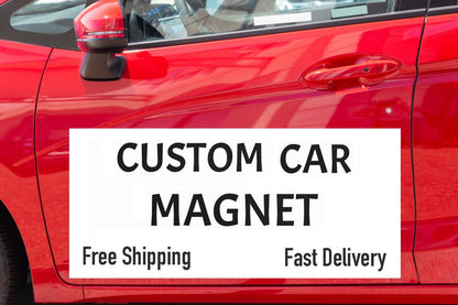 Custom car magnet example placed on red car door 